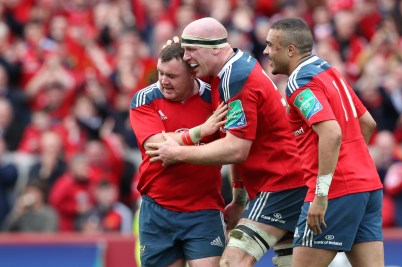 LIMERICK, IRELAND - APRIL 05: Paul O'Connell of Munster is congratulated by Dave Kilcoyne (left) and Simon Zebo after scoring the last try for Munster during the Heineken Cup Quarter Final match between Munster and Toulouse at Thomond Park on April 5, 2014 in Limerick, Ireland. (Photo by Patrick Bolger/Getty Images)